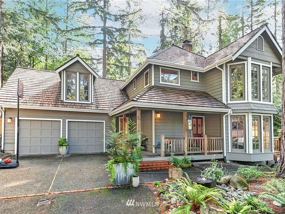 Fall in love with this unique and private home in Canterbury Woods. New exterior paint.