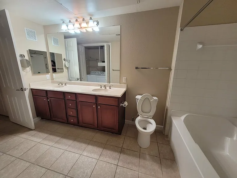 Bathroom (has a separate door both to the living area and to the bedroom)