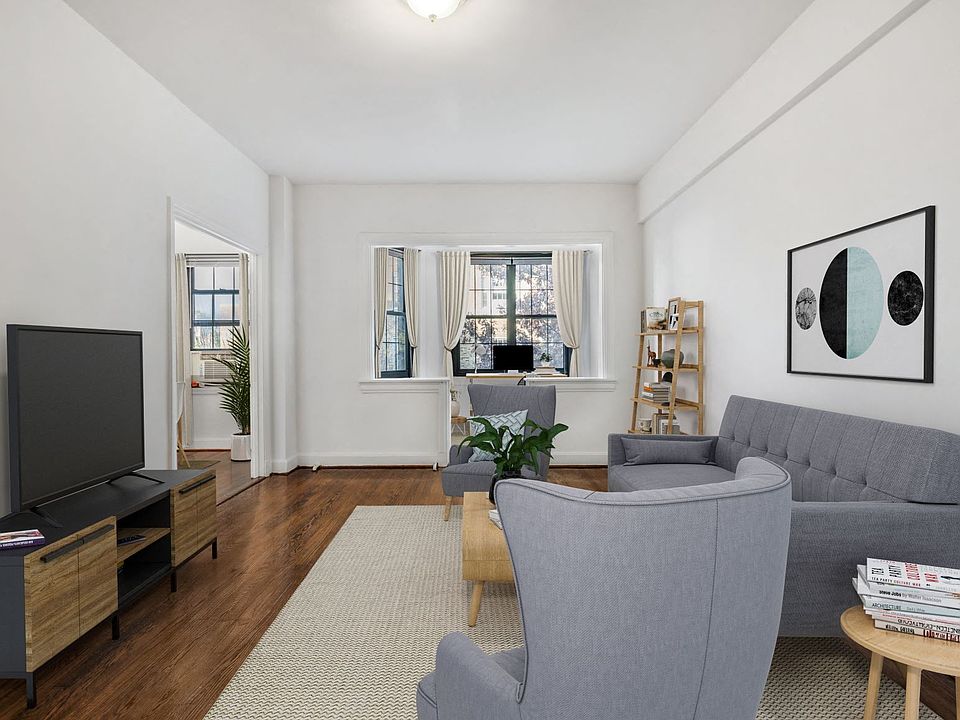 Living and sunroom (virtually staged)