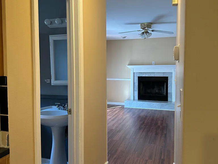 Hallway to 1/2 bath and family rm