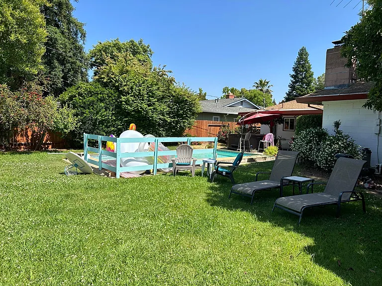 Share large yard in quiet neighborhood.