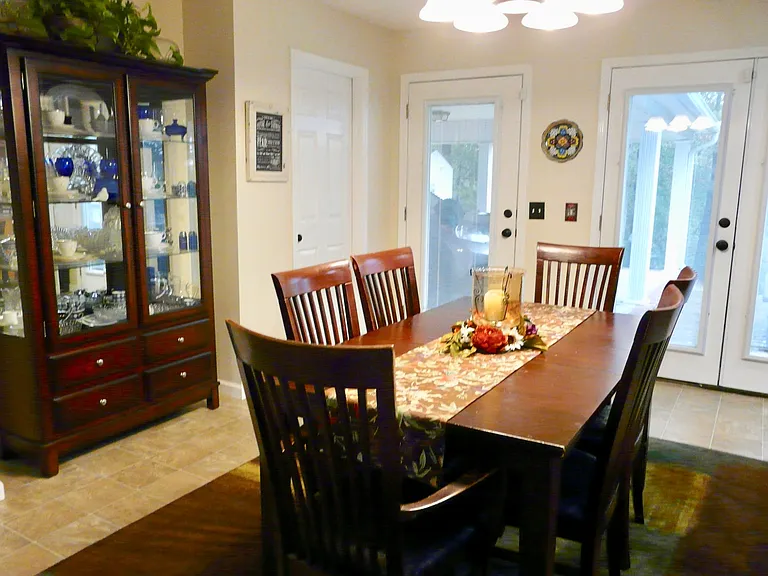 Dining Area--the doors lead out to the Covered Carport/Deck