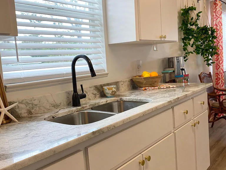 Kitchen - with granite countertops and stainless steel appliances