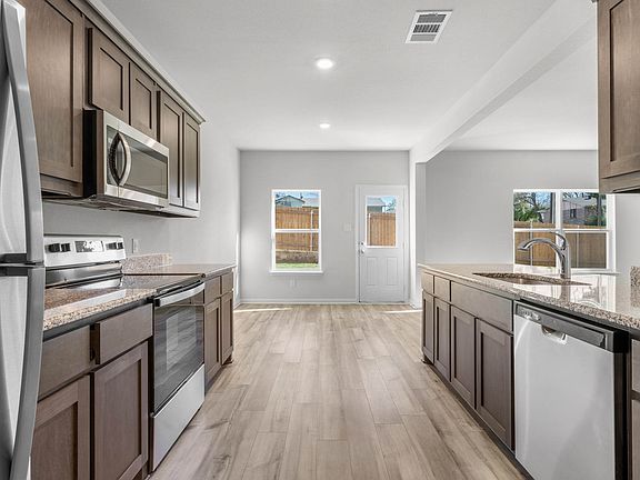 The kitchen of the Cypress has energy-efficient appliances.