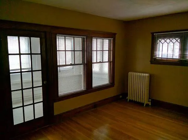 Covered sunroom in the front of living room