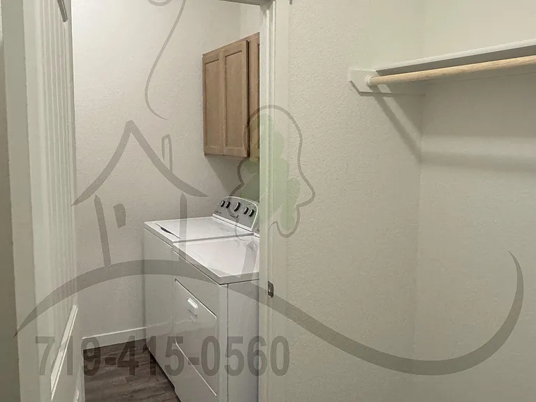 Master Bed Closet with Access to Laundry