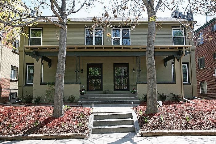 Front of house on left.