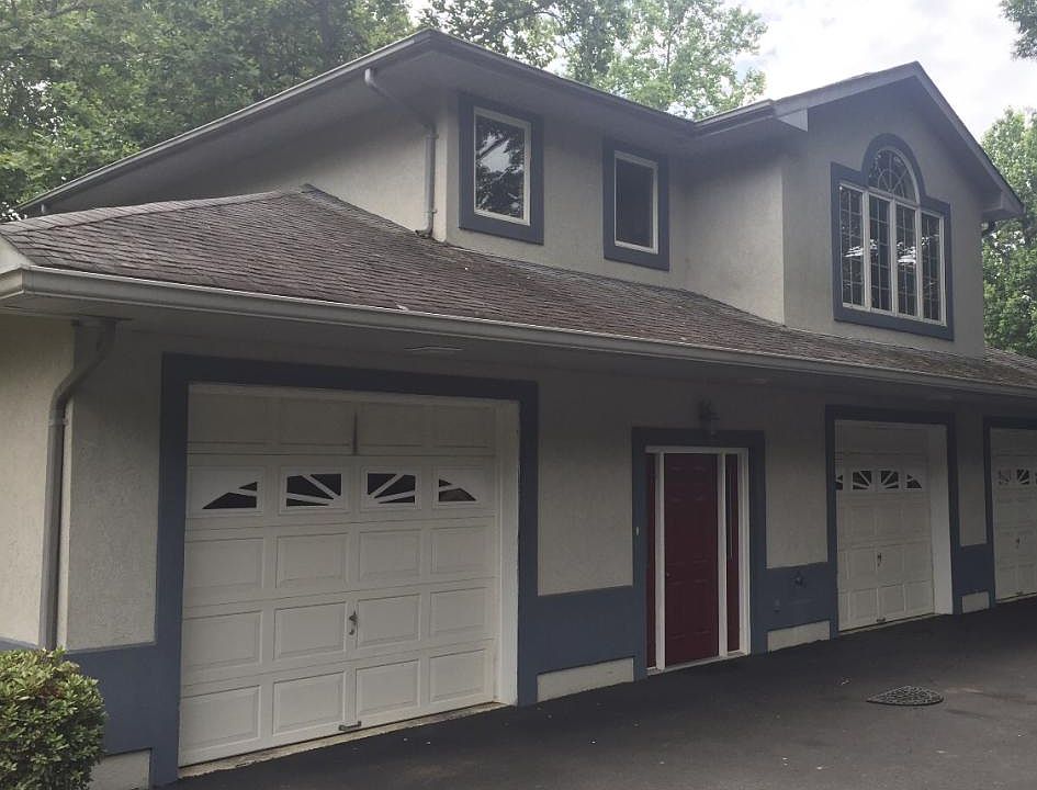 Apartment garage entrance, front door, apartment on second level.