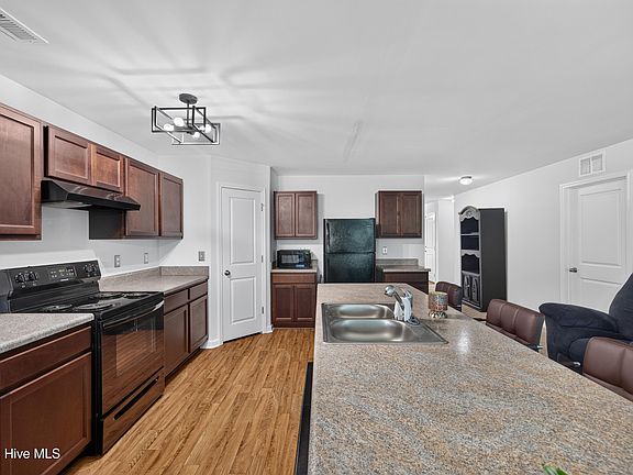 5th image of 1559 W New Carraway Place SE
