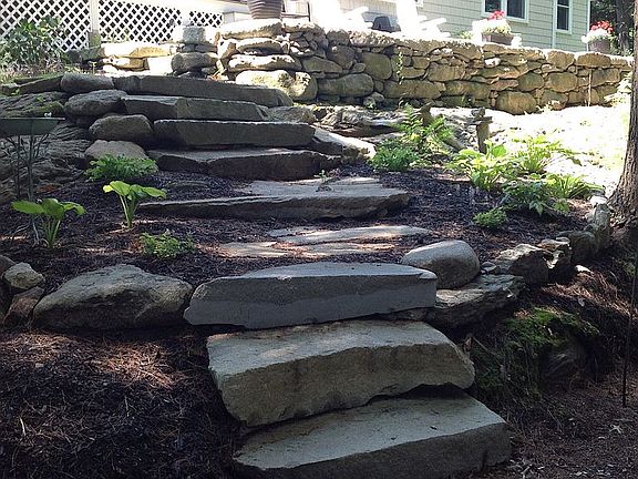 Stairs from patio to ocean.