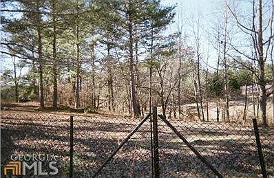 23+ Acres with 3 homes. (one mobile home, one combination home/modular and one brick home.