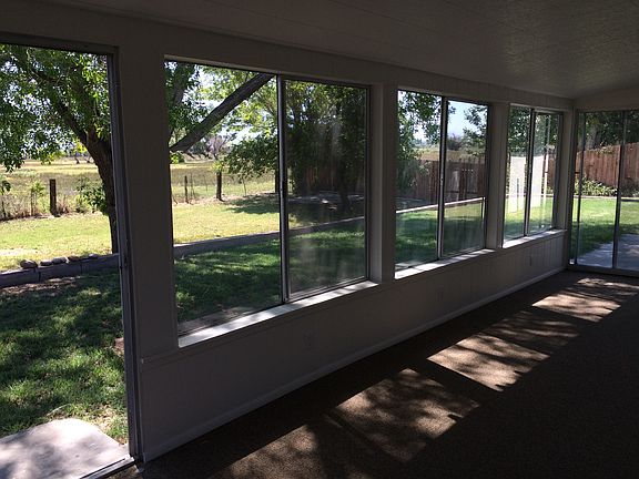 Screened in porch makes for a great extra room all year.