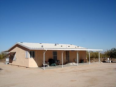 Full length covered patios: front and back.