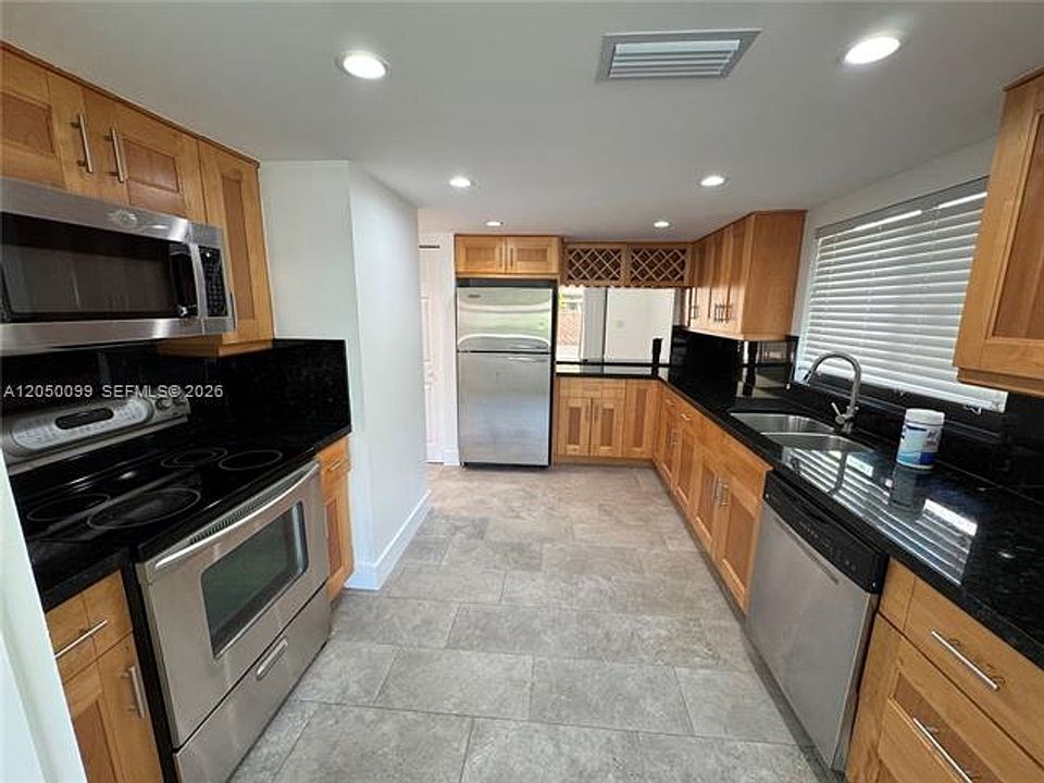 1st image of 12519 SW 94th Ln #Townhouse 12519