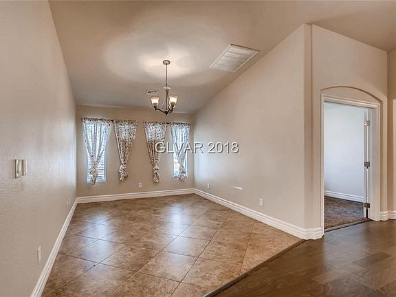 Front formal dining room with tile on the diagonal