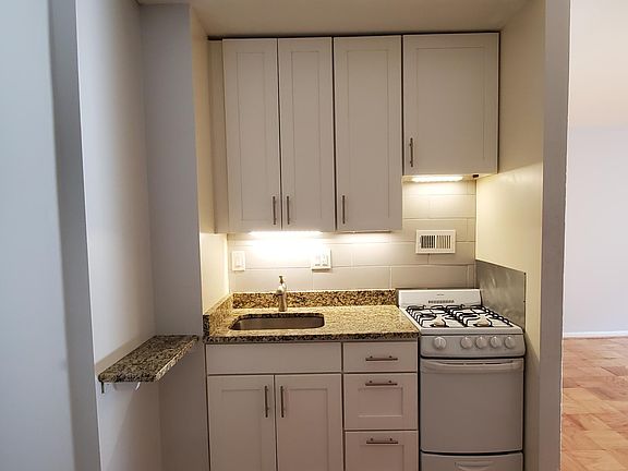 Kitchenette with granite counter