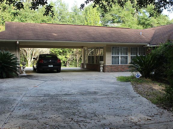 attached 2 car carport with storage room
