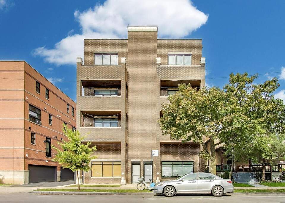Contemporary brick mid-rise with private balconies