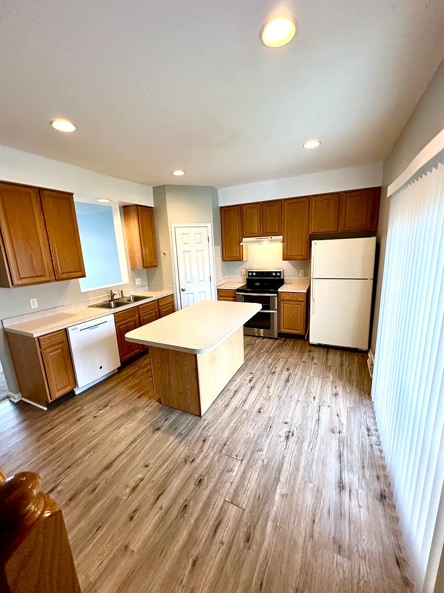 33 Sara Ln - Kitchen w/ Island (kitchen now has new LVP floor and new stainless steel refrigerator) - 33 Sara Ln