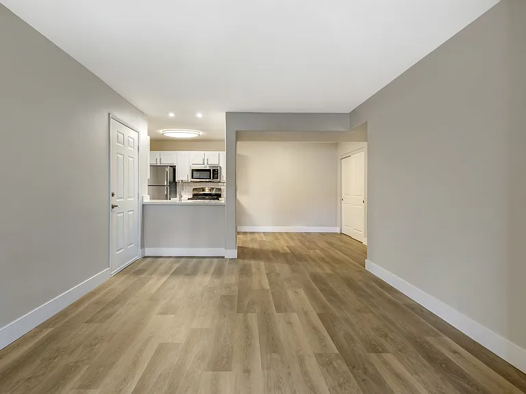The open floorplan seamlessly connects the kitchen to the living and dining areas, making it perfect for entertaining guests or enjoying family meals.