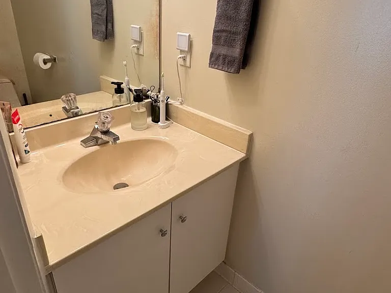 Upstairs half bath with toilet and sink