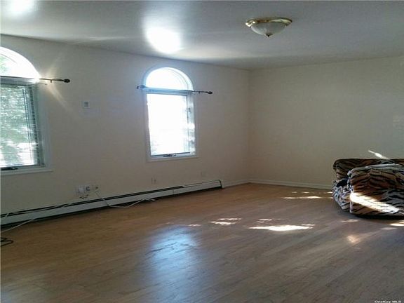 3rd image of 48 Orchard Beach Blvd Floor 1