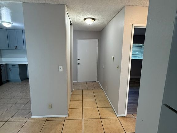 Tiled main living area and entry