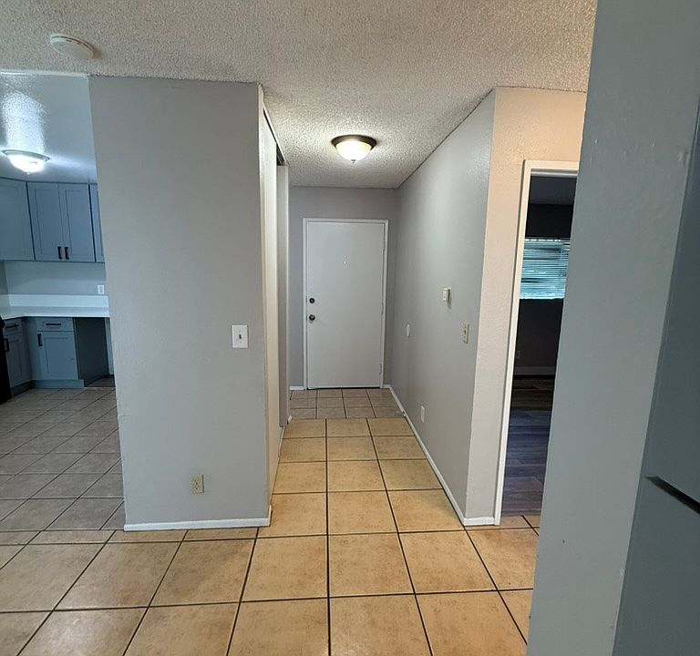 Tiled main living area and entry
