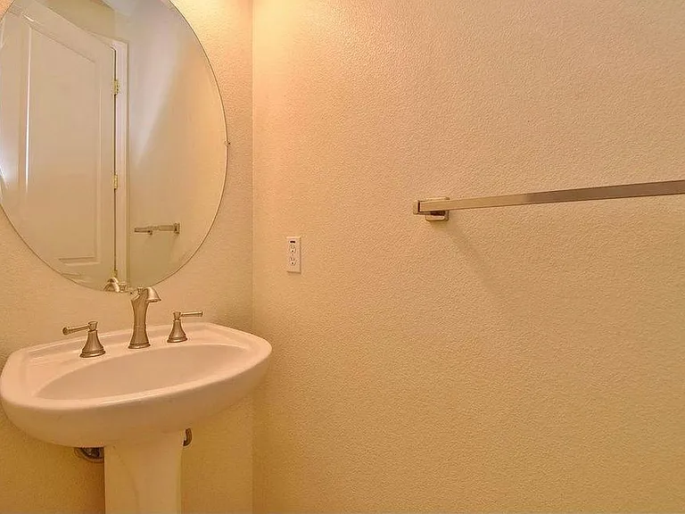 Powder room next to dining room