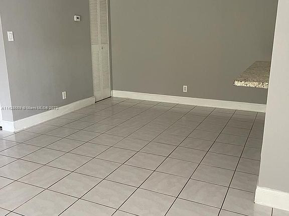 4th image of 411 Gardens Dr APT 103