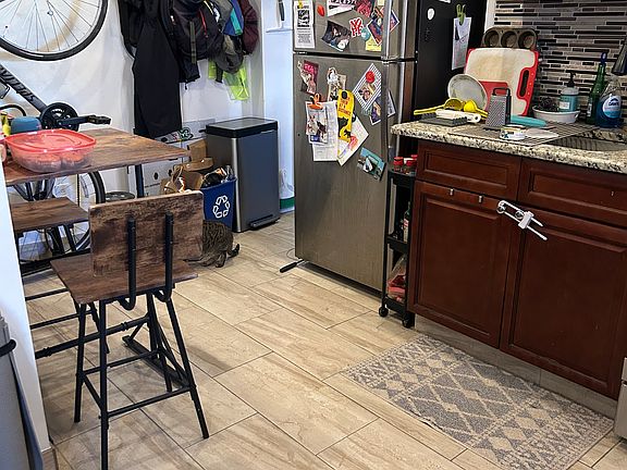 Kitchen with cabinets/countertops