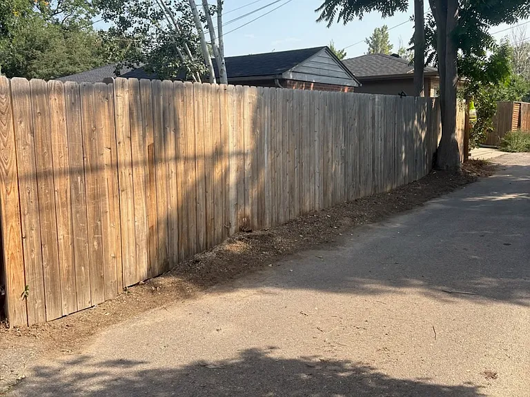 Secure fence and alley entrance.