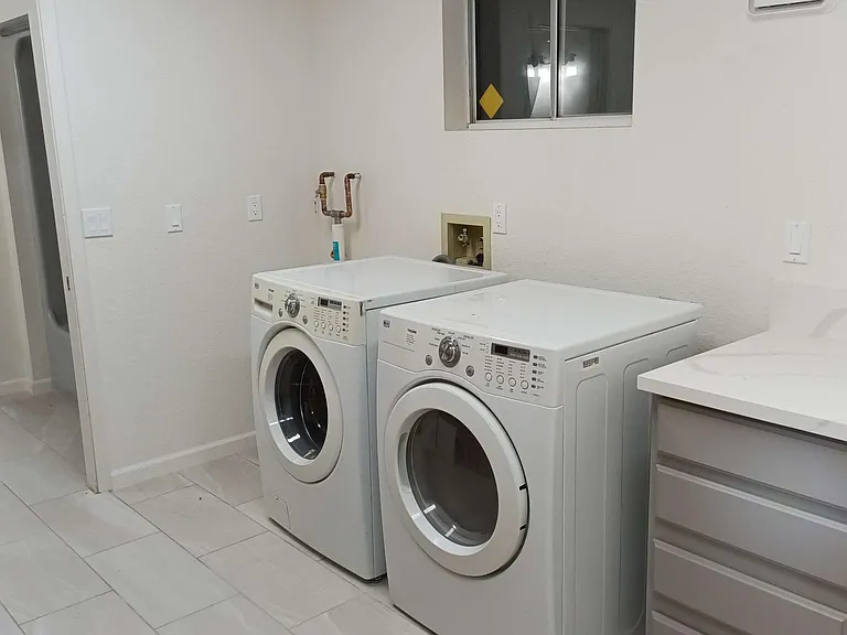 closet with laundry room