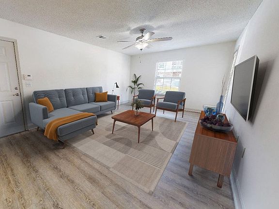 Spacious Living Room with Wood Style Flooring