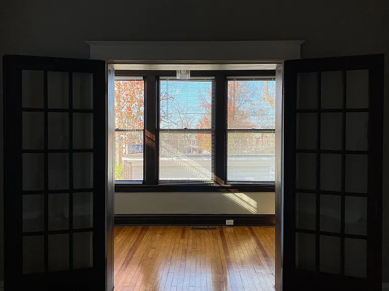 Bedroom view into the sunroom.