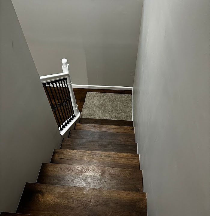 Staircase to upstairs bedrooms and bathrooms
