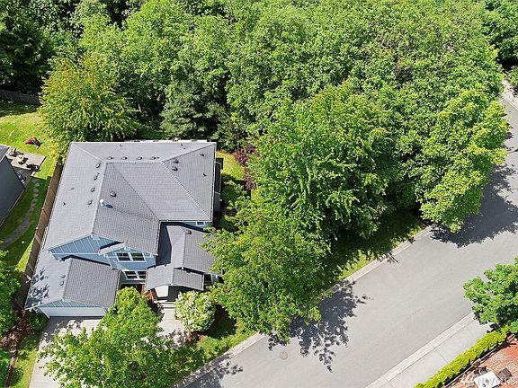 This large corner lot feels like your own private oasis.