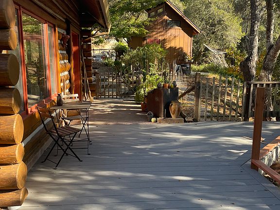 Cabin, new deck, shed (contains washer and dryer)