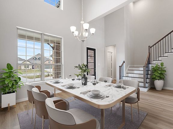 The dining area is a perfect blend of style and functionality, providing an inviting space for memor