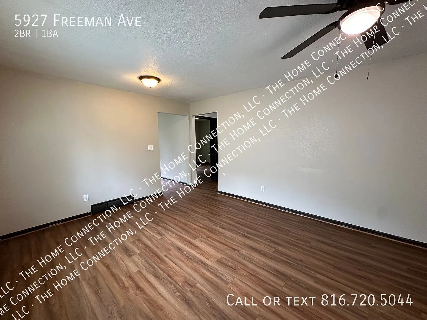 2 Bed / 1 Bath Townhouse with Attached garage & New Flooring! — Photo 2