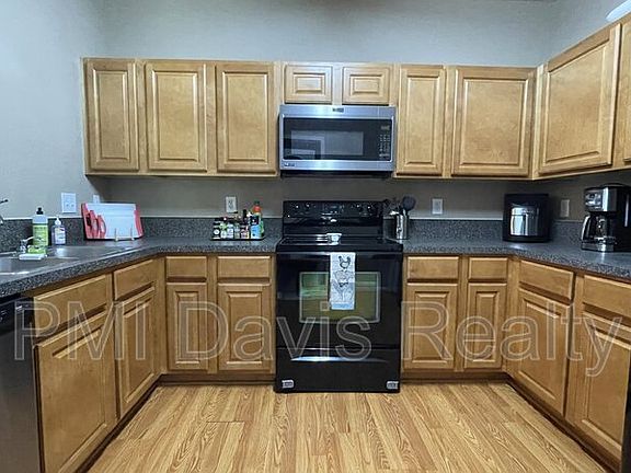 5th image of 6965 Ortega Woods Dr Unit 6-2