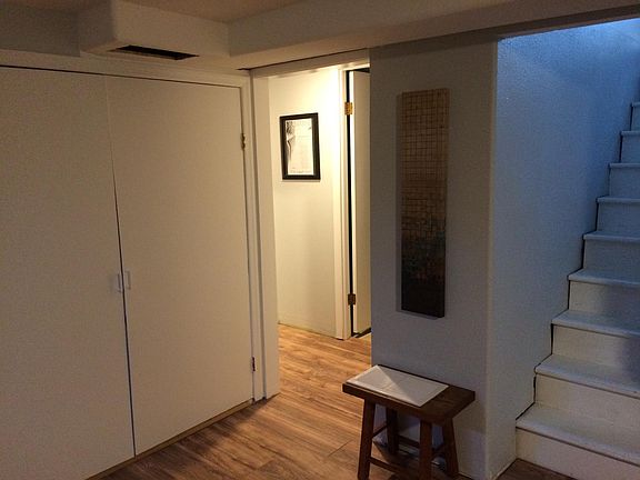 Hallway to bathroom and bedroom