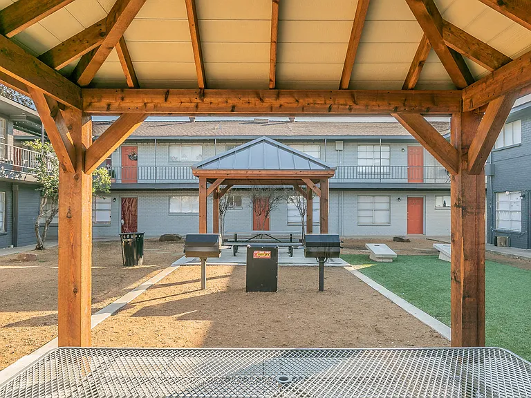 Connect with neighbors at the pavilion and outdoor lounge at Chapel Creek Apartments in Dallas.