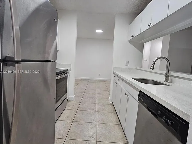 15771 SW 106th Ter #204 — Photo 21