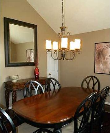FORMAL DINING FEATURING HW FLOORS
