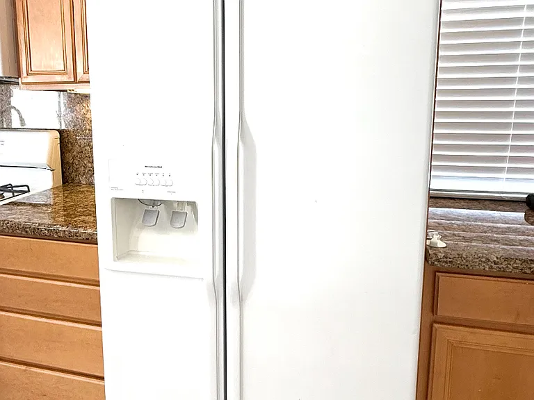Kitchenaid Refrigerator with filtered water dispenser and ice. Landlord provides filters.