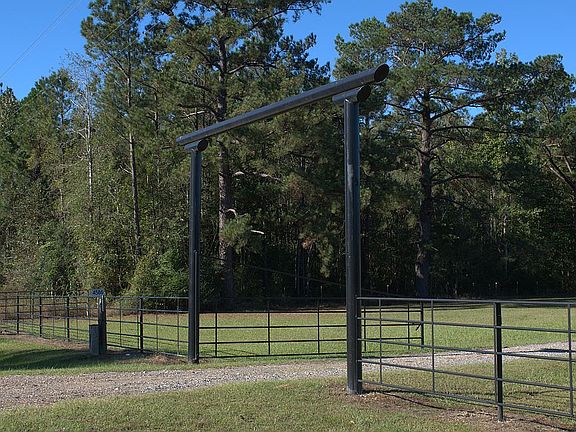 FENCE ACROSS FRONT OF PROPER