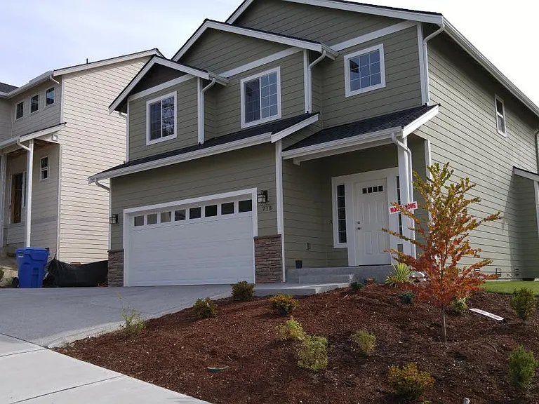 Older photograph, Landscape has grown since this was taken. Backyard Fencing is Completed.