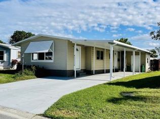 935 Thrush Cir, Barefoot Bay, FL 32976