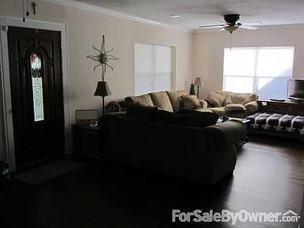 Living Room
						:
						Large living room with wood floor